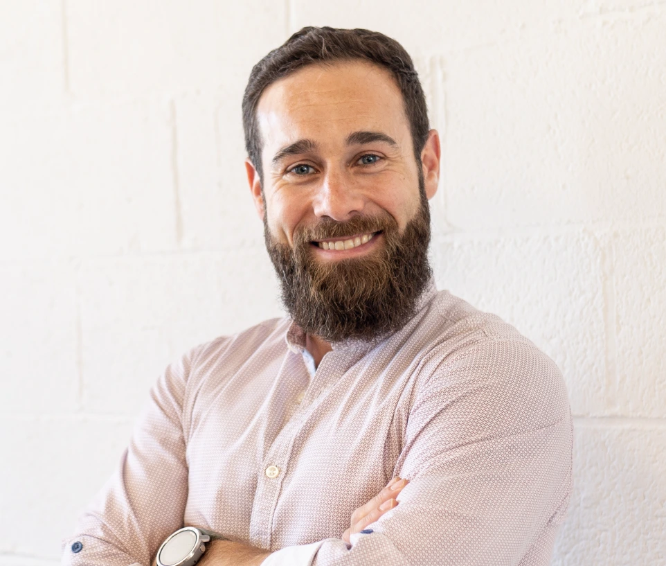 Lucas Lanziotti, LanziCo founder with arms crossed smiling with a white background